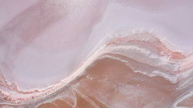 Aerial view of Lake Bumbunga, a naturally occuring pink salt lake beside the small town of Lochiel in South Australia
