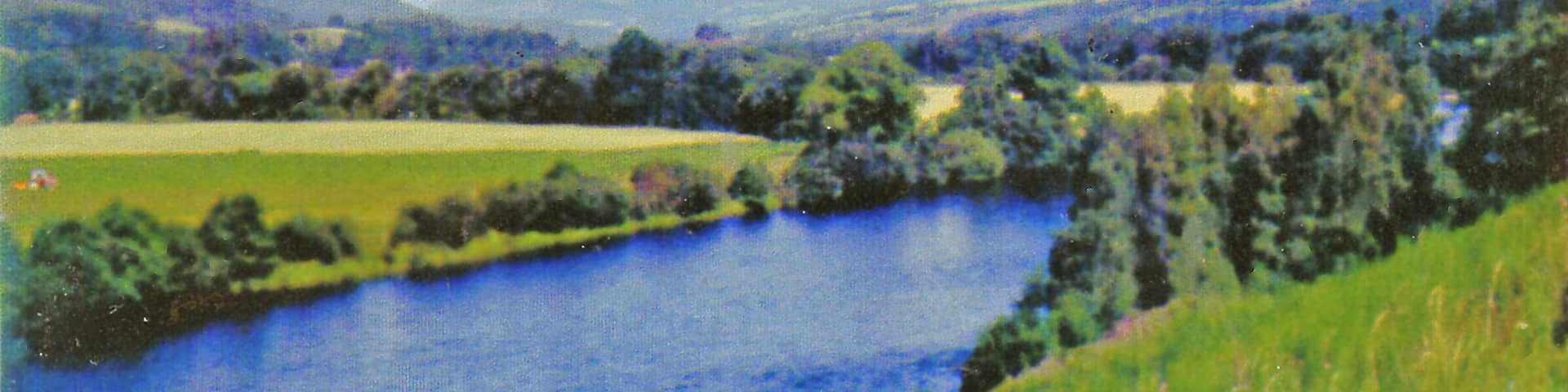 Northward on A9 nearing Dowally beside River Tay, 1979. A few miles upstream of Dunkeld, with Ben Vrackie (2,757 ft.) in the distance.