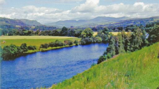 Northward on A9 nearing Dowally beside River Tay, 1979. A few miles upstream of Dunkeld, with Ben Vrackie (2,757 ft.) in the distance.