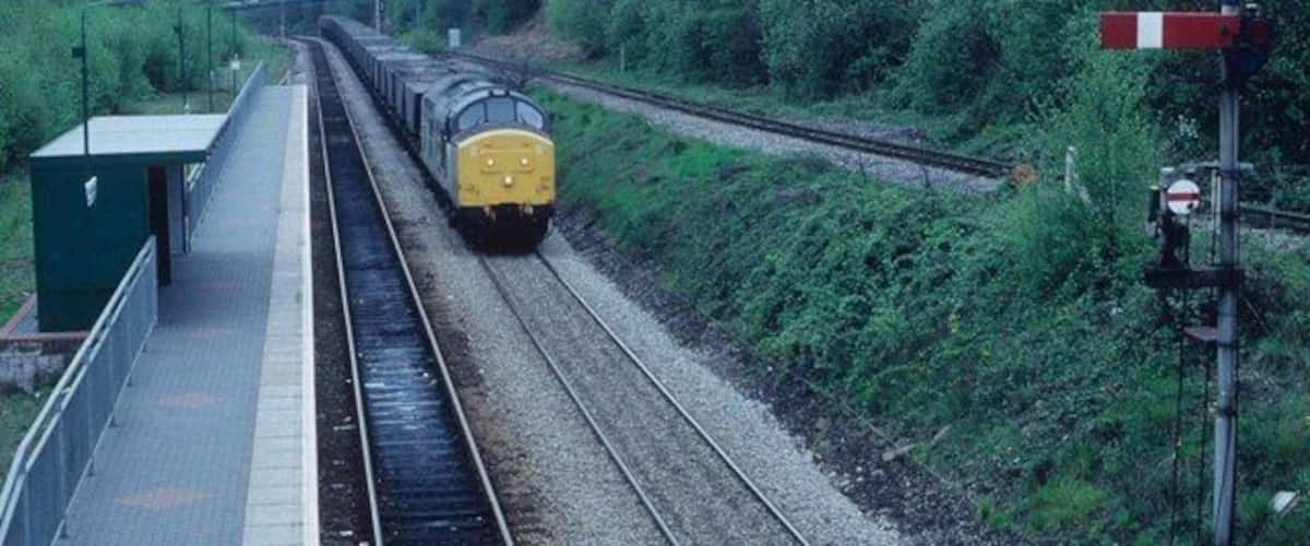 Coal empties at Ystrad Mynach. Coal empties for Penalta colliery on a grey Welsh day .