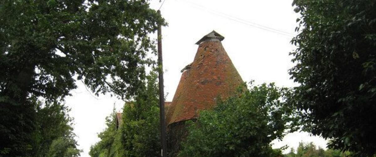 Unconverted Oast House at The Batteries, Claxfield Road, Lynsted, Kent. Two round kiln and one square kiln oast house. Unusually the two round kilns appear to be interconnected, the nearest roundel only accessible through its neighbour. Grade II listed http://www.imagesofengland.org.uk/details/default.aspx?id=176261