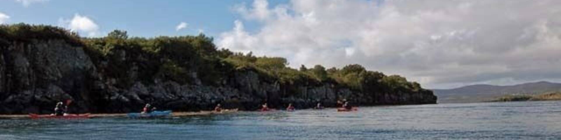 Sea kayaking along the Ulva shoreline Heading out on a four day sea kayak expedition from Ulva Ferry.