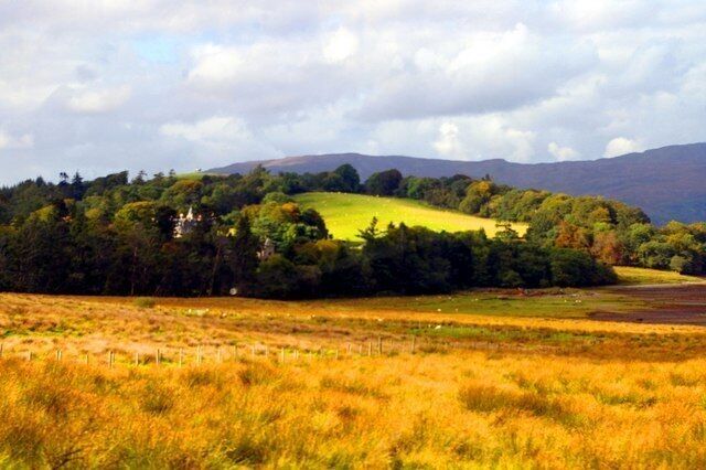 Torosay Castle / Caisteal Thorosaigh The castle and policies seen from the Duart road across the head of Camas Mòr.