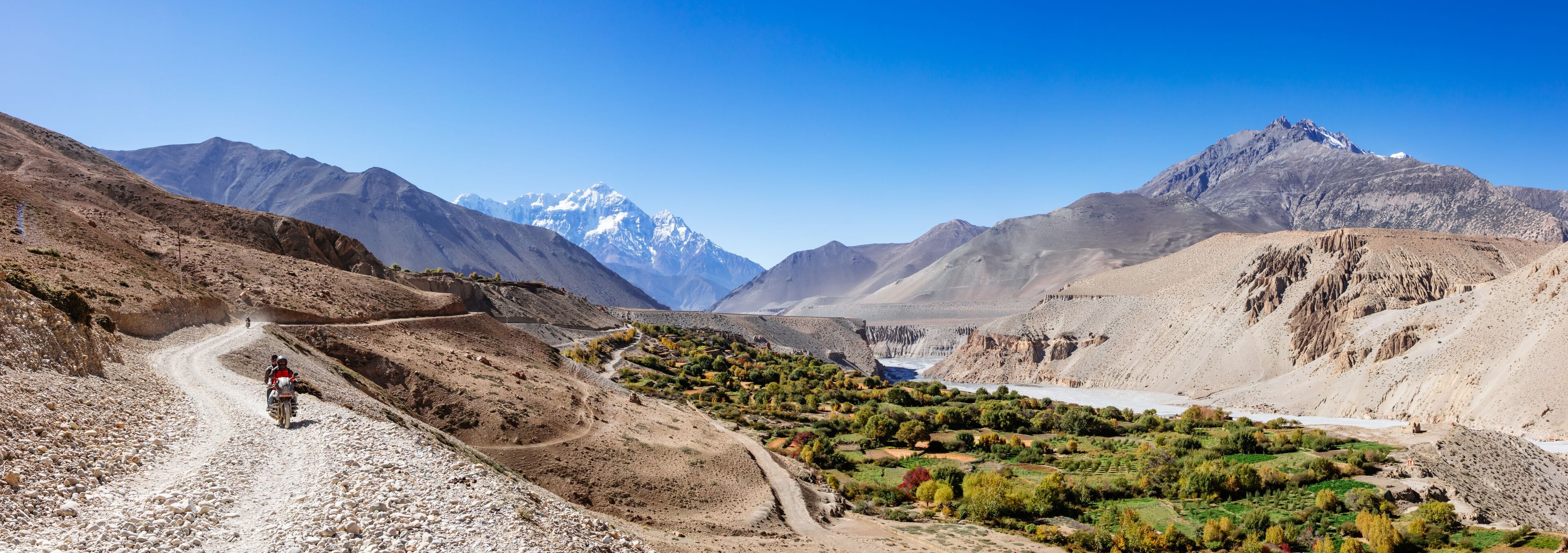 Motorcycle on dirt road, Upper Mustang region, Nepal