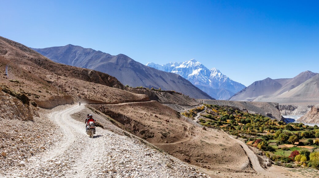 Motorcycle on dirt road, Upper Mustang region, Nepal