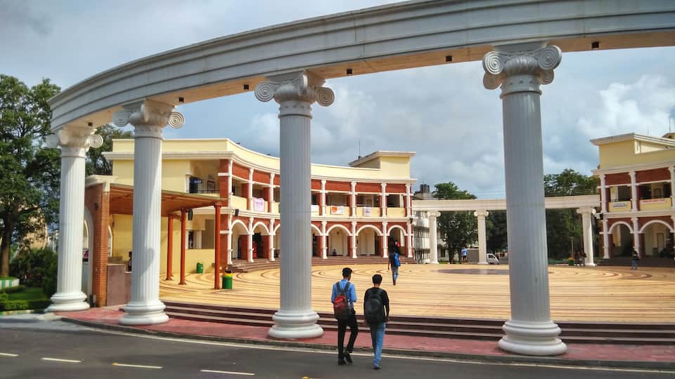 A building with classical columns and a courtyard.