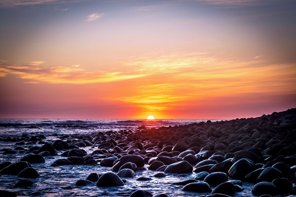 Today's second surfing session ended up with this majestic sunset. Can't get enough of this!