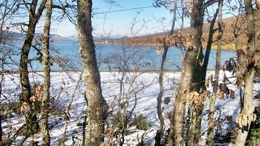 It was constructed in 1959, when the dam of Tavropos was completed and it is one of the most beautiful corners of Greece since then. The area offers excursions throughout the year.