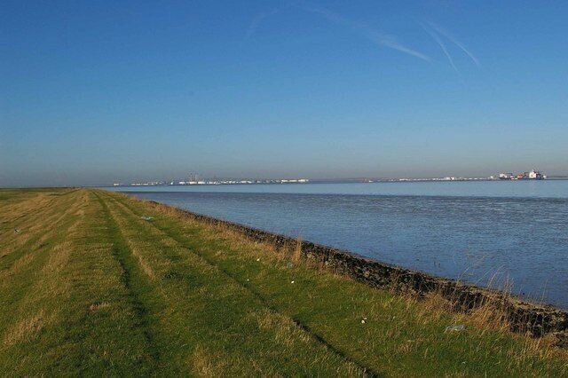 St Marys Sea Wall This is the sea wall on the Kent bank of the Thames north of the St Marys Marshes. The Picture is looking towards the coryton Oil refinery on the Essex side of the river