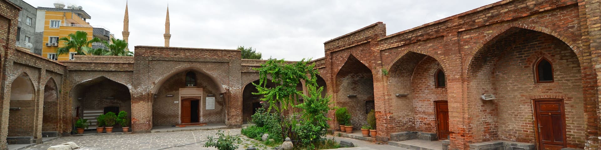 Red Madrasa built on the ruins of the city walls in Cizre, Turkey. There are estimates that the building was built in the early 14th century.