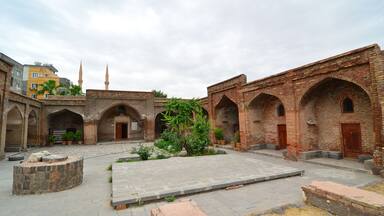 Red Madrasa built on the ruins of the city walls in Cizre, Turkey. There are estimates that the building was built in the early 14th century.