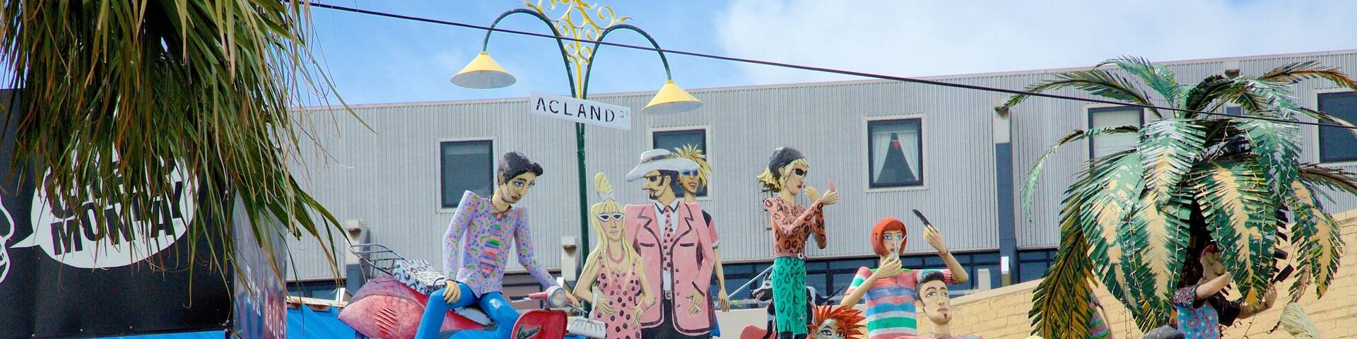 Acland Street featuring signage and outdoor art