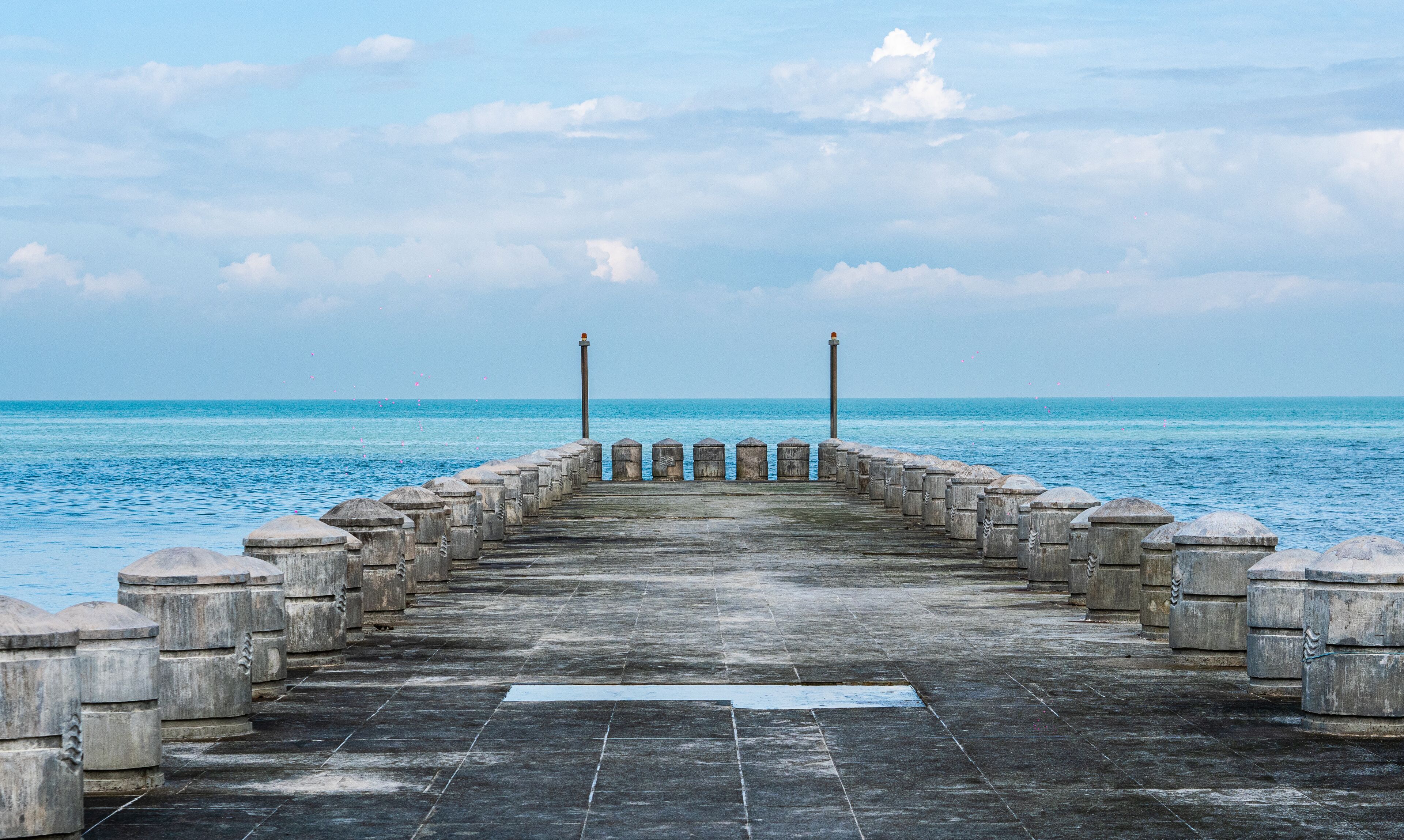 Stone grey jetty pierce in malaysia penang sea blue water