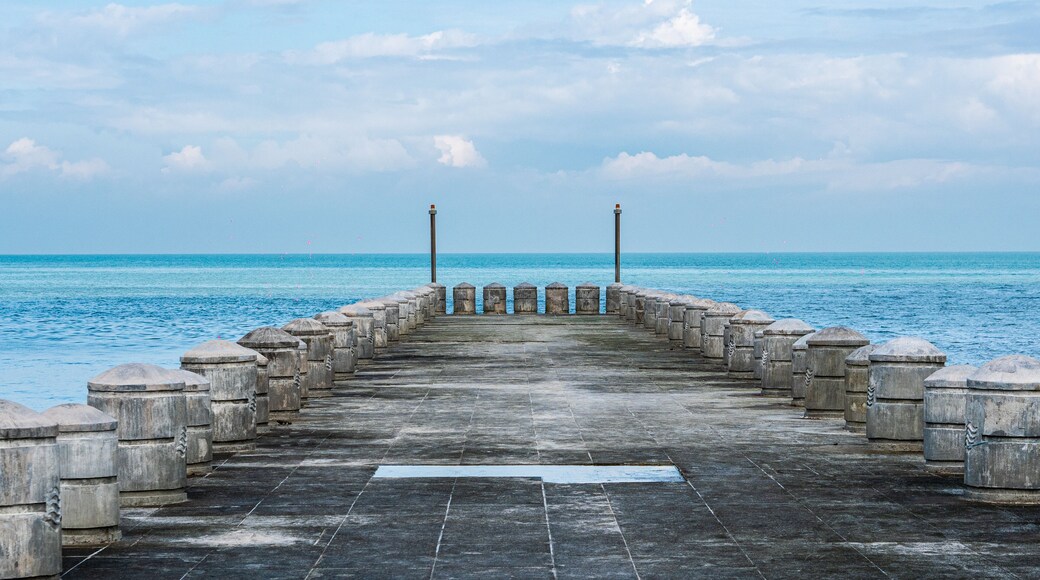 Stone grey jetty pierce in malaysia penang sea blue water
