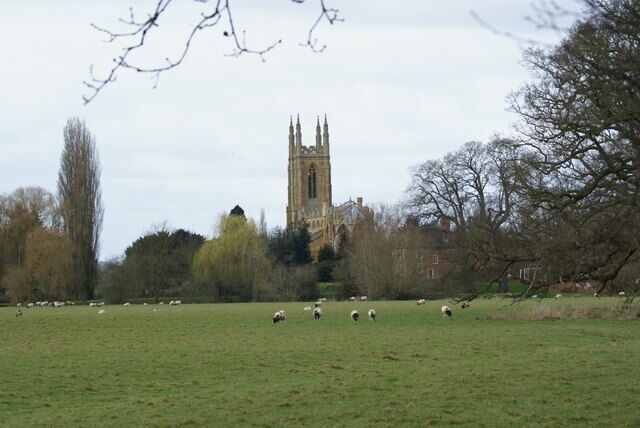 To the sky St Peter Ad Vicula in Hampton Lucy rises above the floodplain between it and the Wellesbourne road. The tower is mirrored by the tall tree to the left.