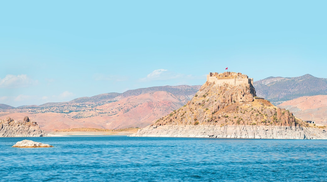 Pertek castle located in Pertek district of Tunceli - Pertek, Turkey Keban dam lake in the foreground