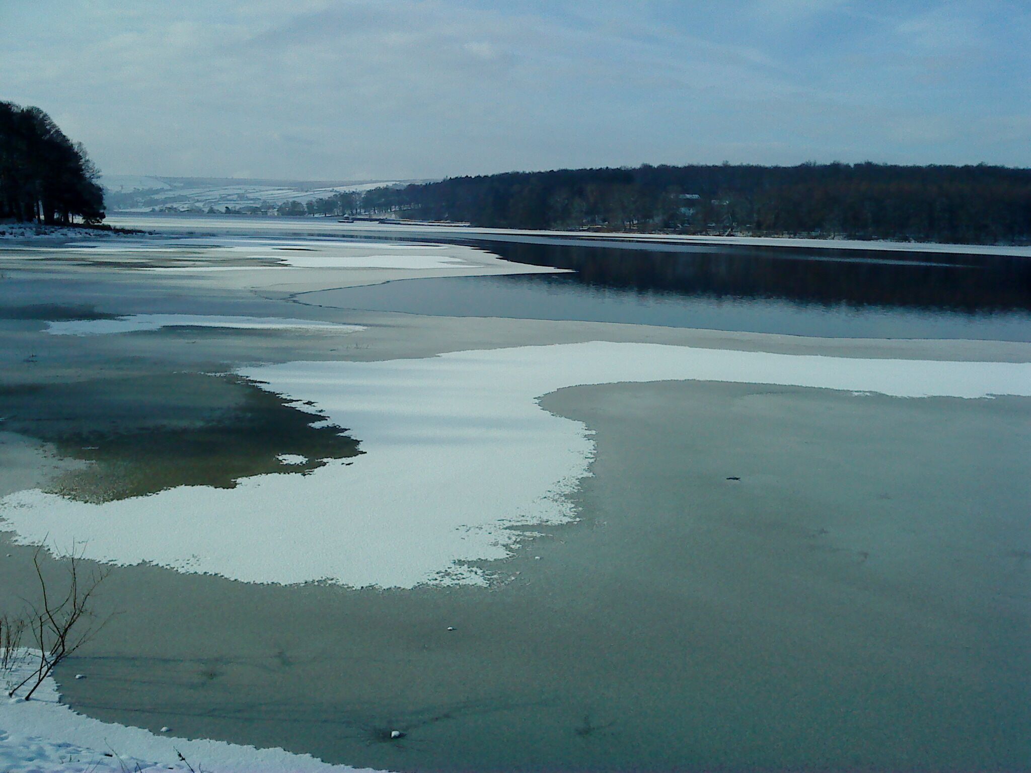 Swinsty Reservoir Partially covered in ice and snow.