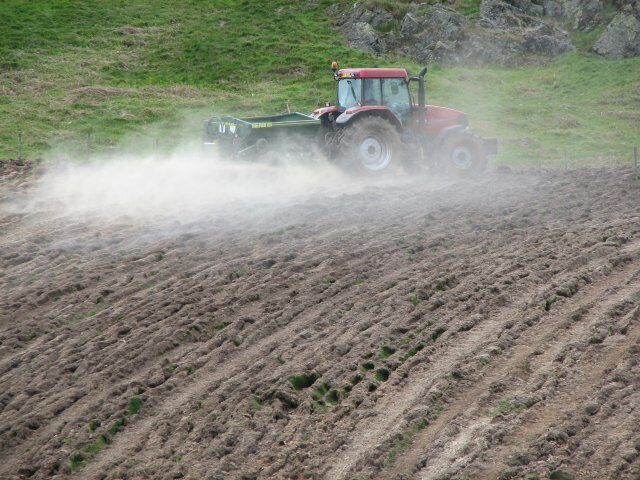 Tractor and trailer. Working a rough field below Scroggy Hill. The 1940s map seems to ignore Scroggy Hill's very existence.