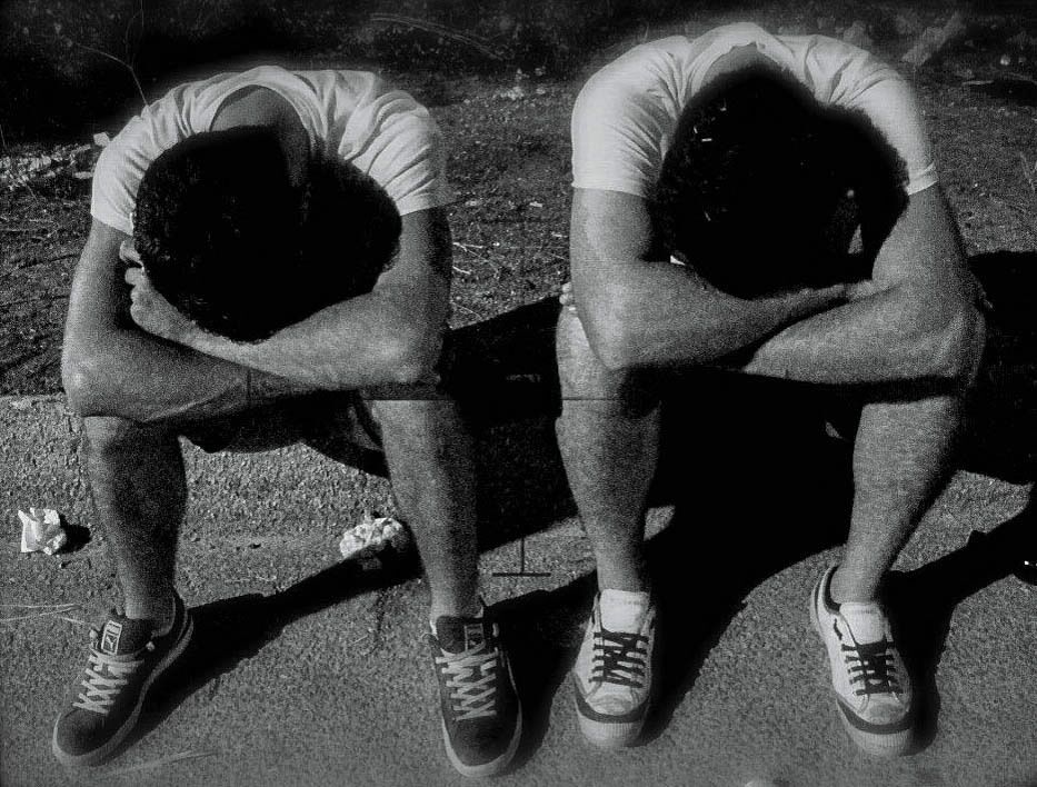 Guys very tired after "the night of Taranta" in Melpignano (Lecce, Italy). "La Notte della Taranta" is the biggest festival in Italy and one of the most significant manifestations of popular culture in Europe. It takes place in Salento and is dedicated specifically to the rediscovery and enhancement of the traditional music of Salento and its fusion with other musical idioms, from world music to rock, from jazz to symphonic music.