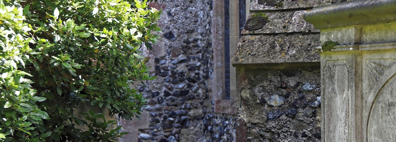 The north aisle northwest buttress of the Grade II* listed St Mary the Virgin's Church in Woodnesborough, Kent, England. Camera: Canon EOS 6D Mark II with Canon EF 24-105mm F4L IS USM lens. Software: File lens-corrected, optimized, perhaps cropped, with DxO OpticsPro 11 Elite, and likely further optimized with Adobe Photoshop CS2.