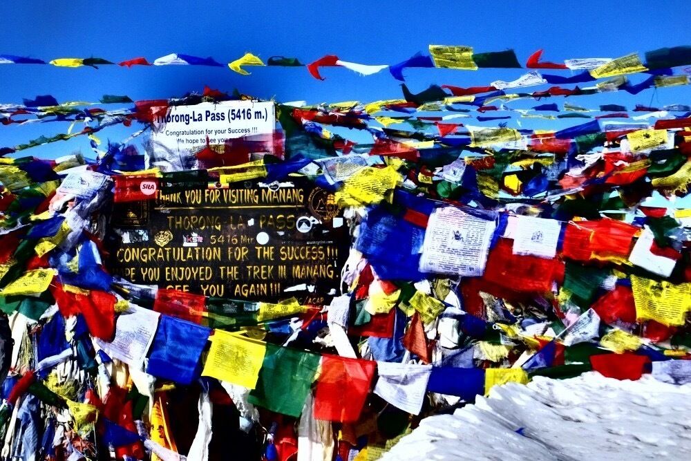 One of the toughest things I have ever done: the Annapurna Circuit, a 14 day trek in Nepal, and reaching the Thorong La Pass at 5416m on the 10th day. It was very challenging - particularly as I was ill when doing it. 

A true bucket list experience I would not want to have missed!

http://bit.ly/15DKOju

#alifefullofserendipity #serendipitytess #nepal #thorongla #trekking #annapurna #prayerflags