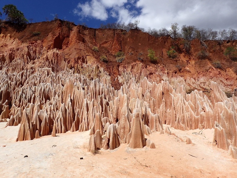 Amazing calcite formations left behind after the red mud has been washed away. You need a good 4x4 and driver to reach it as it takes a serious bit of off-roading to get there. You can also only see them in the dry season as the bottom of the valley is a river at any other time. There is a small place selling food where you park and a toilet!