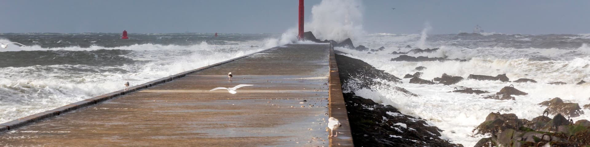 Stormy weather at the pier of Hoek van Holland, a seaside and port town along the Dutch coast near Rotterdam; Hoek van Holland, Netherlands