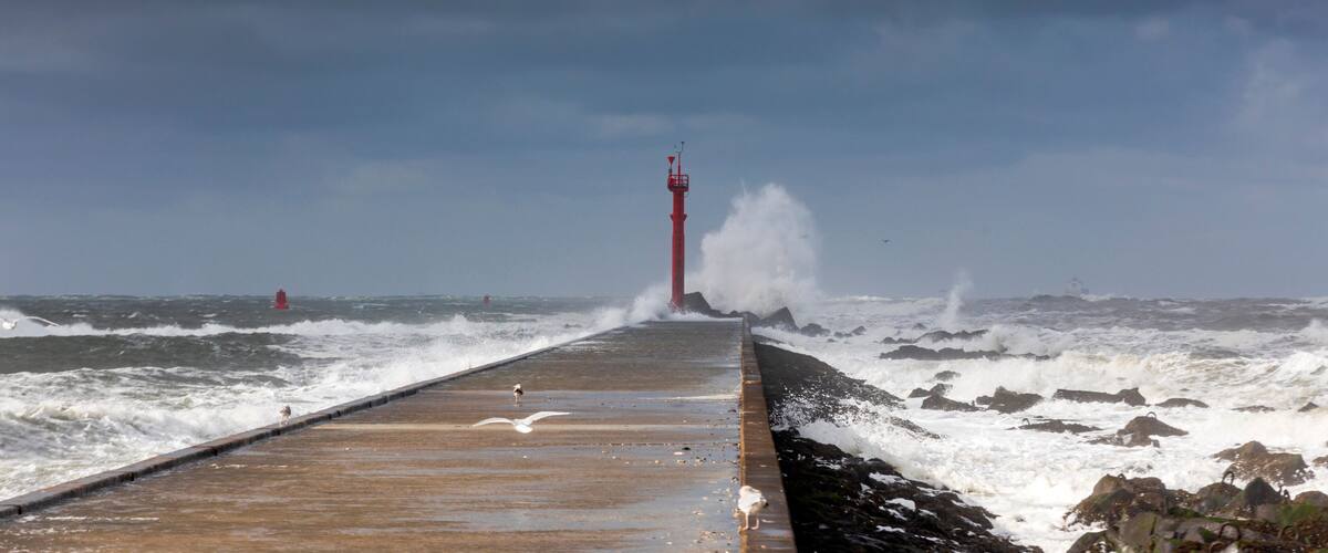 Stormy weather at the pier of Hoek van Holland, a seaside and port town along the Dutch coast near Rotterdam; Hoek van Holland, Netherlands