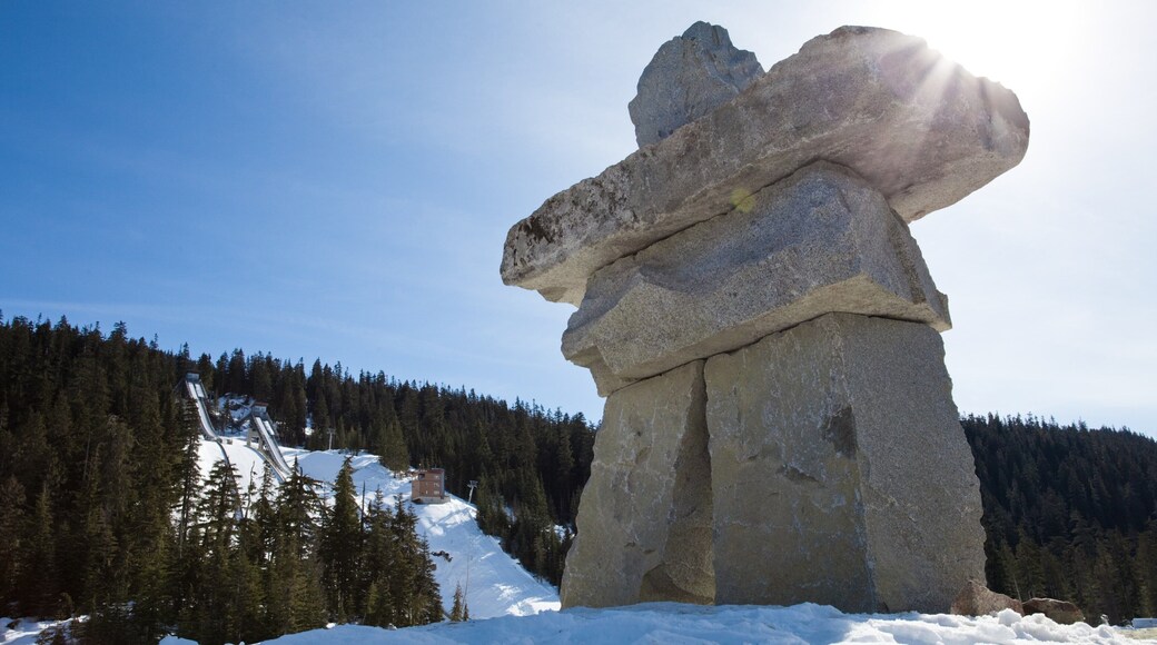 Sea to Sky Highway which includes snow and a sunset