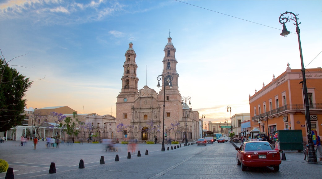 El Bajio which includes a church or cathedral, a sunset and heritage architecture