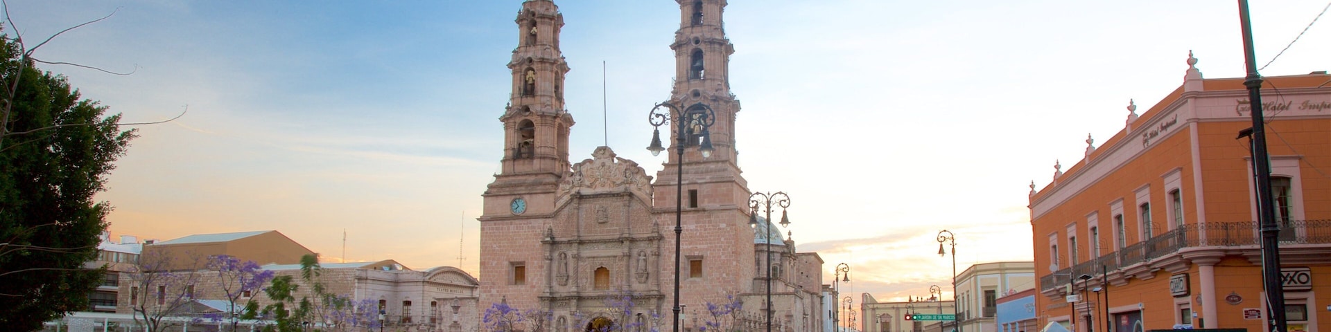 El Bajio which includes a church or cathedral, a sunset and heritage architecture