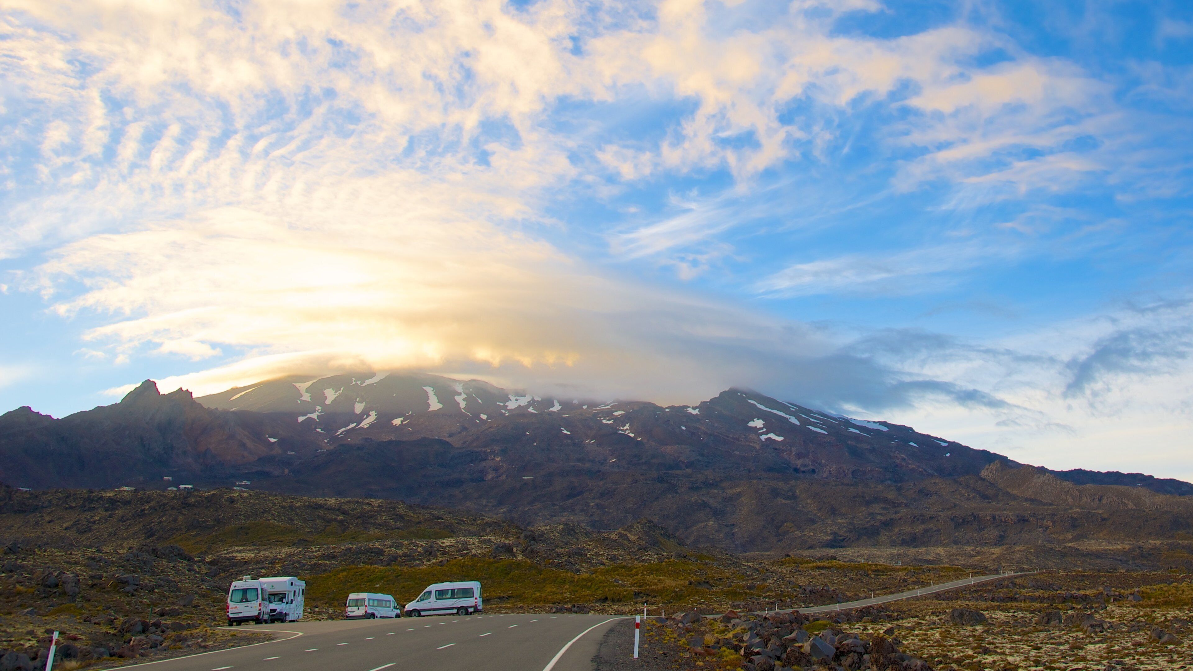 Turangi which includes a sunset and mountains