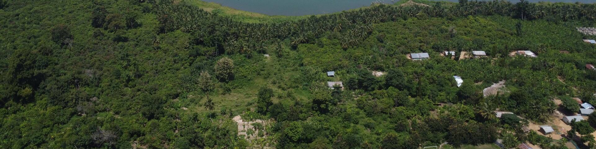 Scenic View of Lake Bosomtwe Surrounded by Lush Forest, Ghana