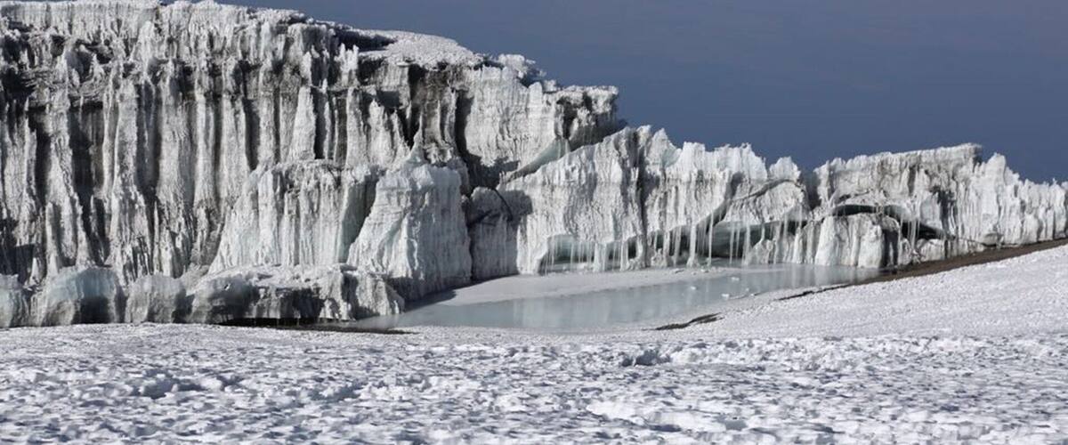 A good view of remaining glacier in the top of highest mountain in Africa Mount Kilimanjaro a thousands of clients seek to climb it in a year ,why not you be among of them ,choose African Love Birds Adventure for the trek.