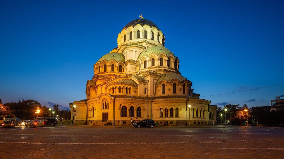 Alexander Nevski Cathedral which includes religious aspects, a church or cathedral and night scenes