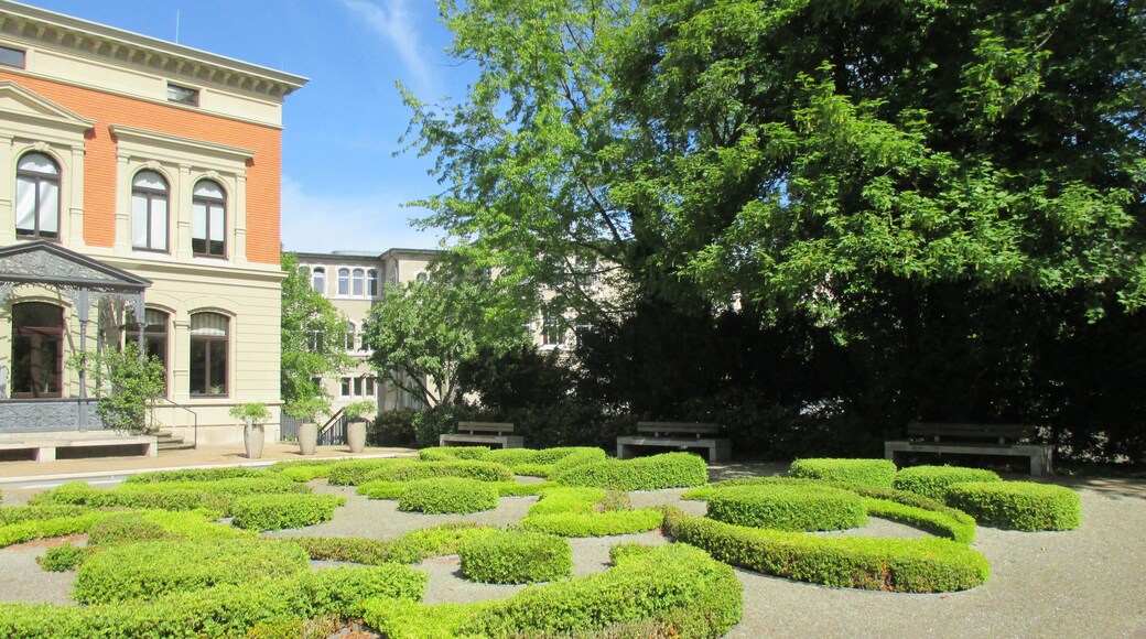 view over the special garden and the water reserve to the building
