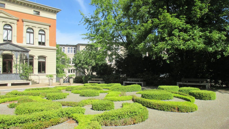 view over the special garden and the water reserve to the building
