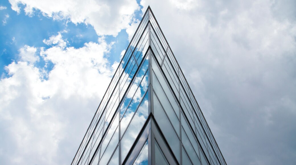 Highest position on Explore: #155 on Saturday, July 30, 2010 Düsseldorf’s waterfront has been spectacularly transformed into an architectural wonderland with a collection of striking contemporary buildings. The place (Medienhafen) is supposed to resemble an outdoor art museum, with trendies, radio stations, advertising agencies and other assorted fashionistas making it their literal and spiritual home. Starting in the early 1980′s, the 234 metre height Rheinturm tower, featuring the world’s largest decimal clock, became the symbol of Düsseldorf. Later, Californian architect Frank Gehry (of Bilbao’s Guggenheim Museum fame) was responsible for Neuer Zollhof 1 and 2, the twin über-quirkily shaped white/aluminium-clad building block creations. You simply can’t miss either the 62-metre high Colorium tower block full of blue, red and yellow coloured panels by British designer William Alsop, or the Neuwerk and Roggendorf-Haus blocks complete with 29 colourful giant human-like figures hanging onto the facade like so many Spiderman-lost-his-way parodies.