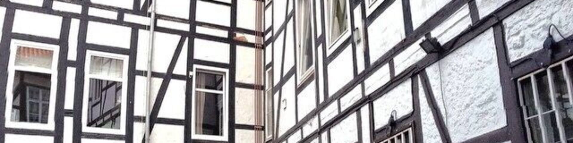 A traditional half-timbered building with a sign reading "Bonn-Viertel".