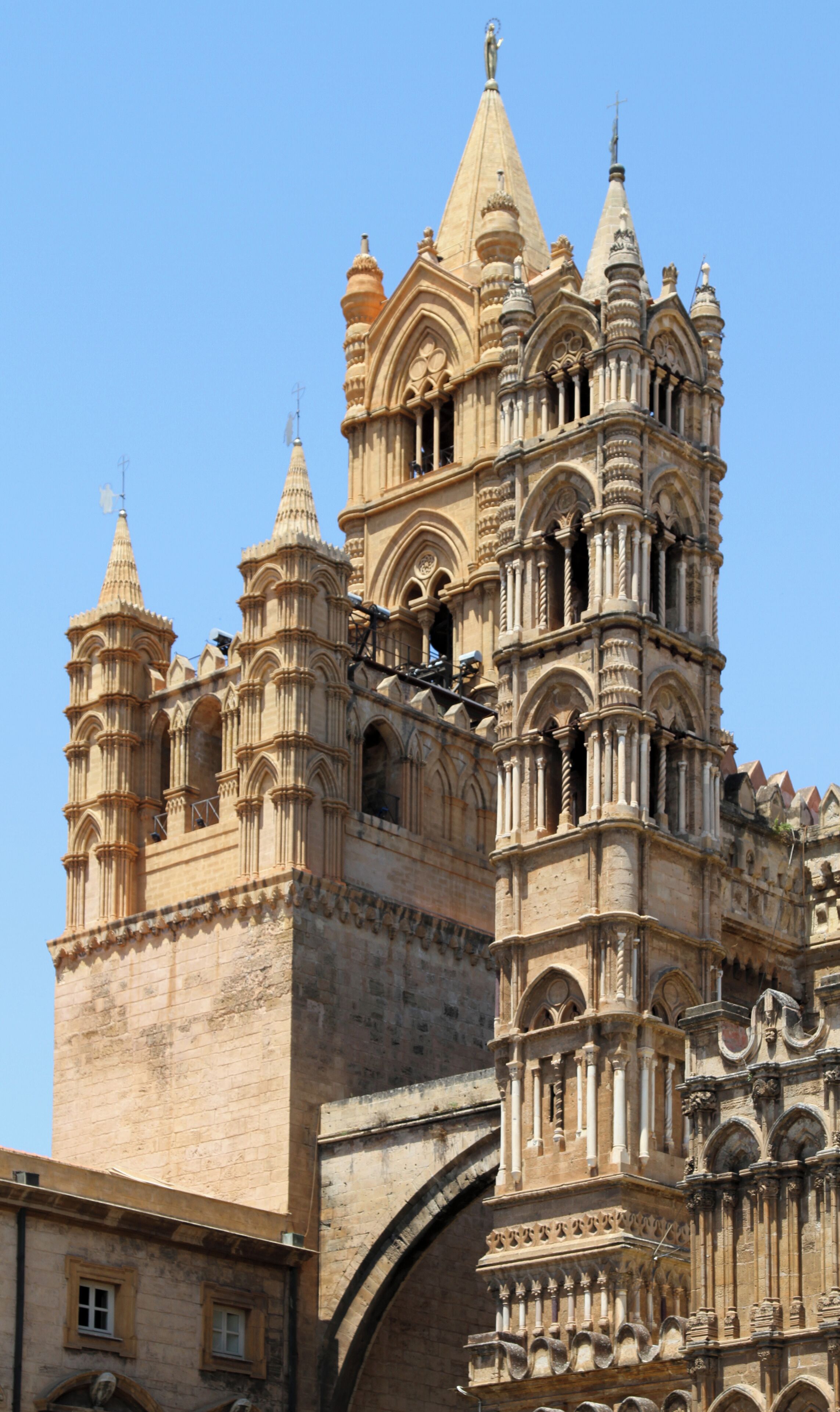A historic cathedral with intricate Gothic architecture, featuring multiple spires and ornate stonework.