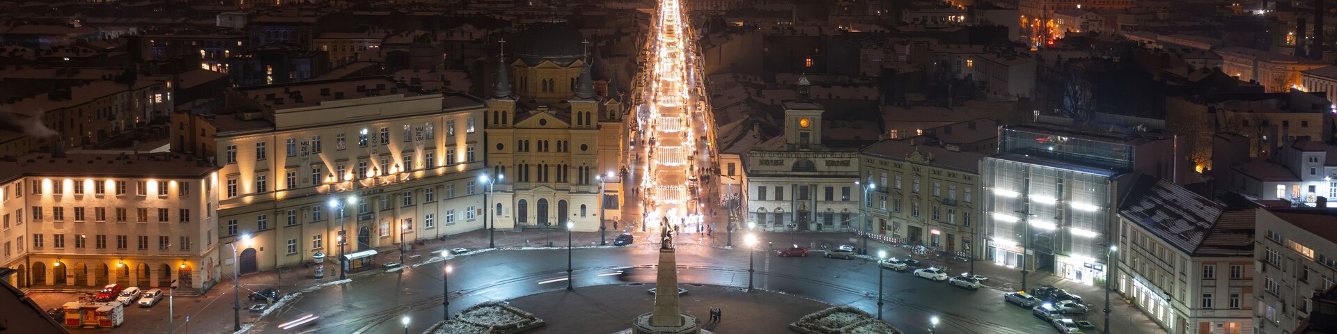 Aerial night winter view above Independence square and Piotrkowska street in Łódź, Poland