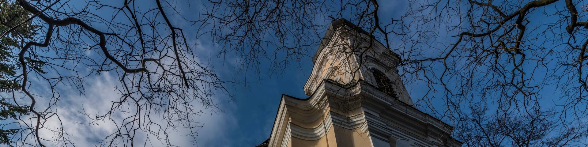 A church with a dome and a bell tower.