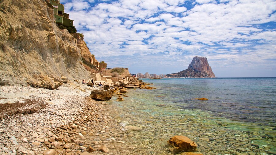 Cala La Manzanera featuring rugged coastline, general coastal views and a pebble beach