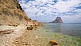 Cala La Manzanera featuring rugged coastline, general coastal views and a pebble beach