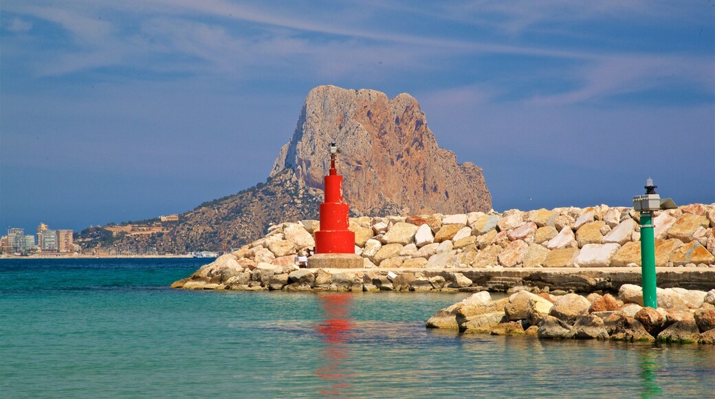 Puerto Blanco Beach featuring general coastal views, mountains and a lighthouse