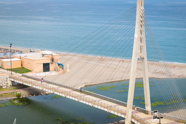 El Castillo Beach showing general coastal views, landscape views and a bridge