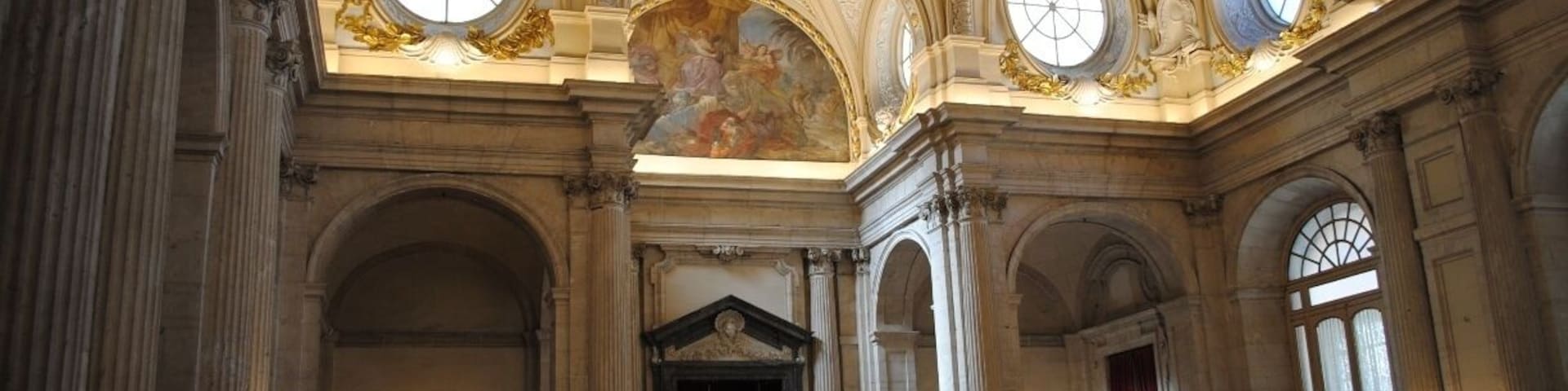 The Royal Palace is very impressive from the outside. Unfortunately, once you've paid for your ticket you learn that the only photos you can take inside are in this central stairwell. While, admittedly, a beautiful room the remainder of the interior is less impressive. The armory is very interesting but placards and signs are only in Spanish.
Its cheap (5-10 Euros) and I would recommend it to kill a couple hours.