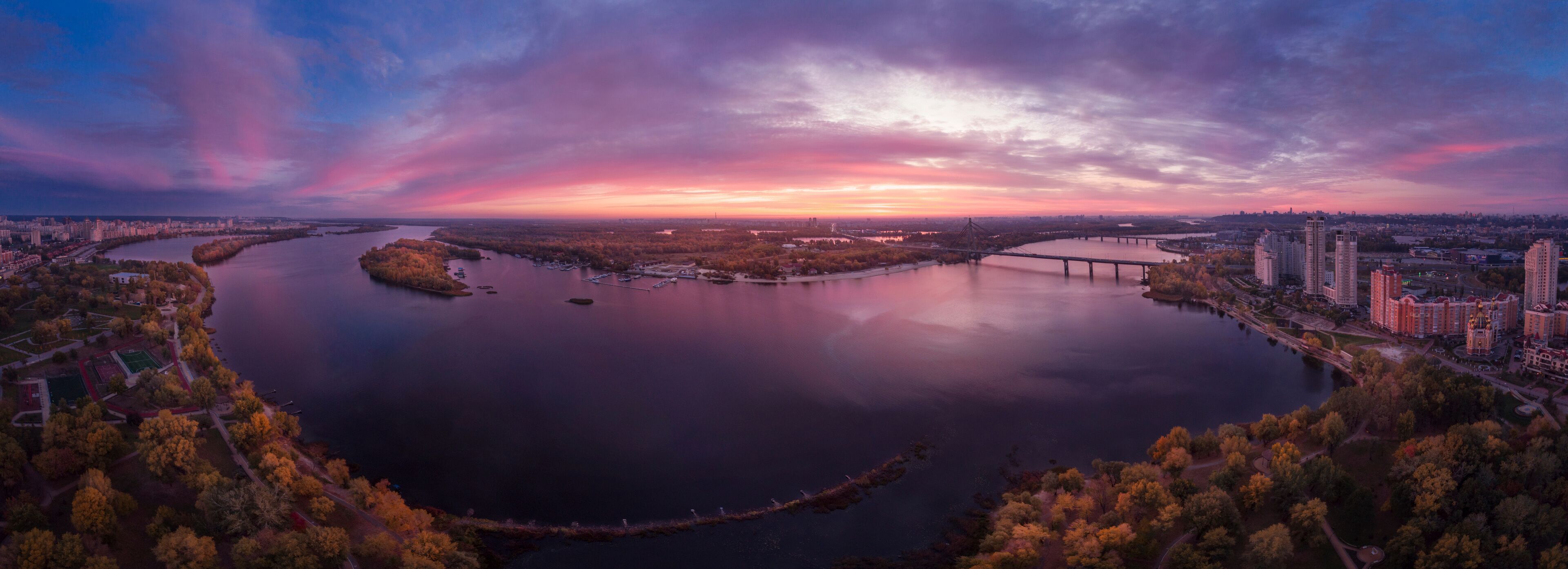 Beautiful panorama of the colorful sunrise over Kyiv, Ukraine