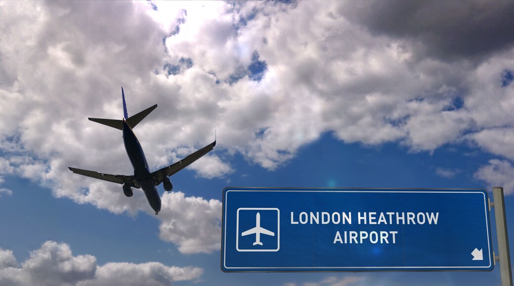 Plane landing in London Heathrow with signboard