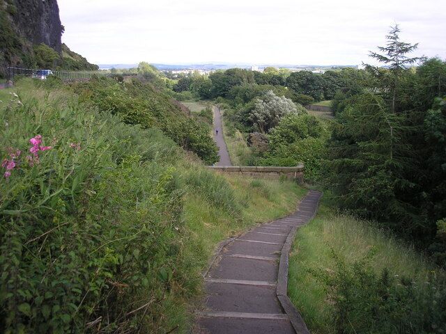 Innocent Railway Cyclepath and Walkway The view of the steps leading down to the eastern end of the tunnel which now forms part of the Innocent Railway Cyclepath and Walkway. A cyclist can be seen on the cyclepath.